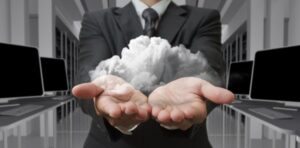 sm-businessman-holding-cloud-in-hands_fyiRFKH_-SBI-300009277